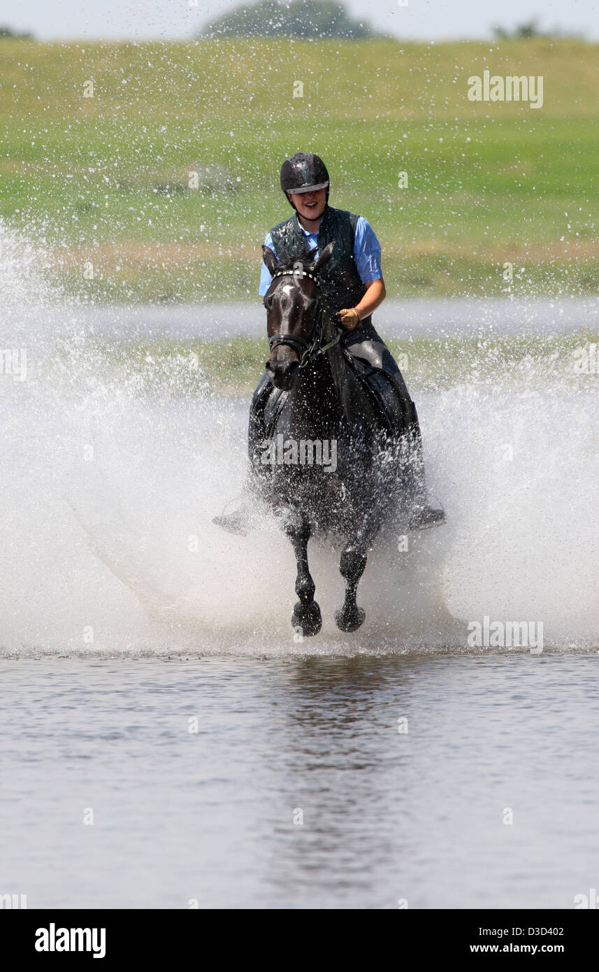 Man Water Rider Man riding horse through water hi-res stock photography and images - Alamy
