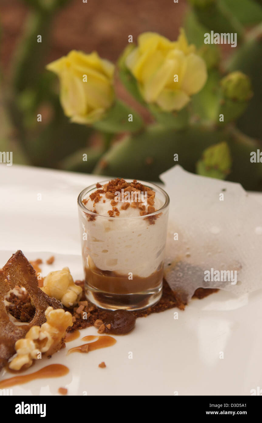 A banana & date parfait served with a date & walnut drizzle Stock Photo