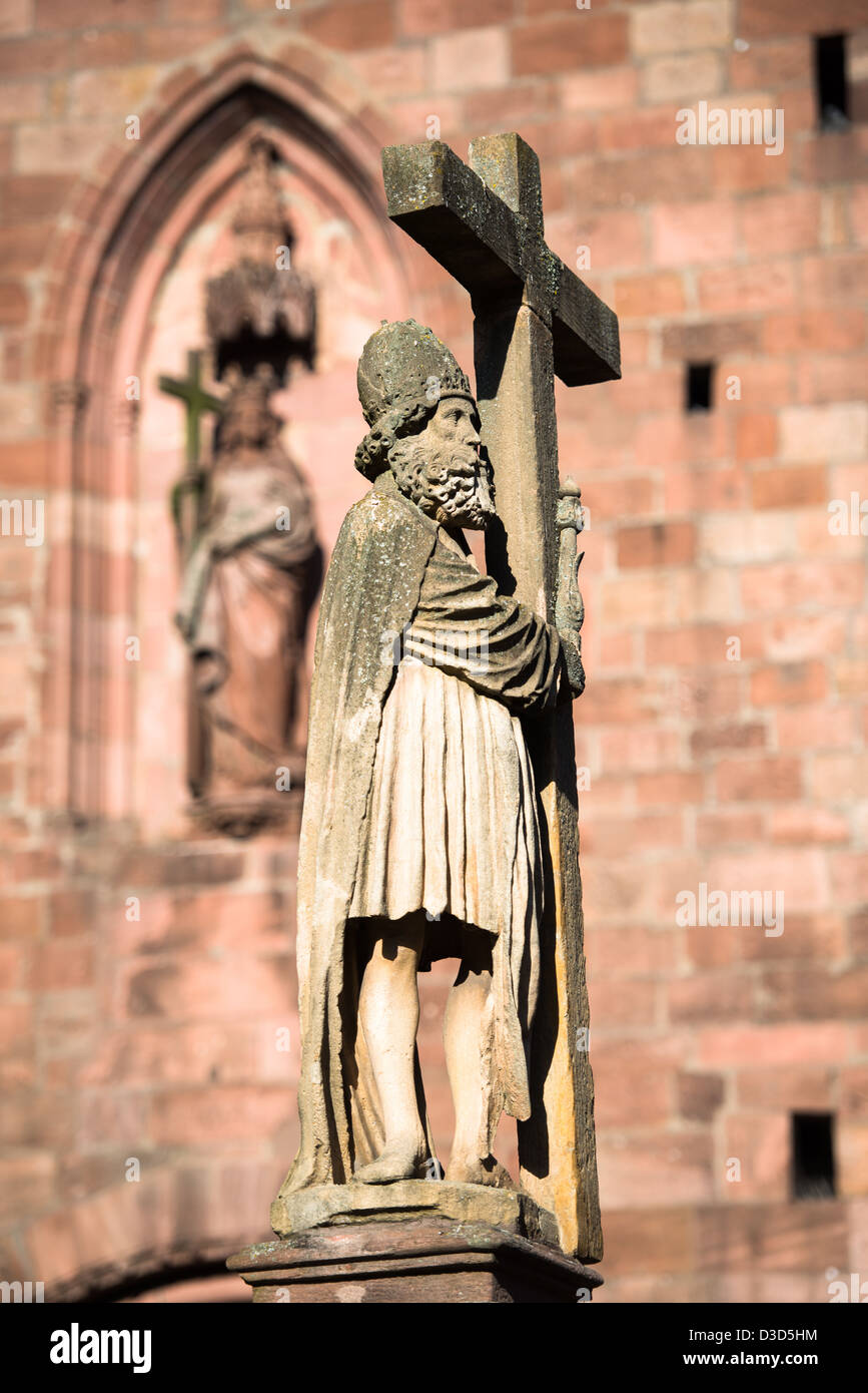 Statue at the top of the fountain in front of the Sainte Croix church, Kaysersberg, France Stock Photo