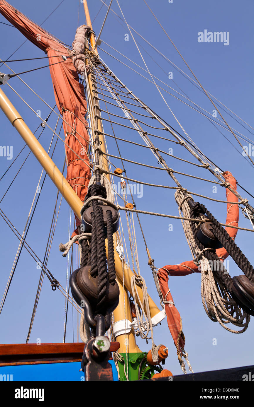 Looking up the mast and rigging of a Thames spritsail barge. Stock Photo