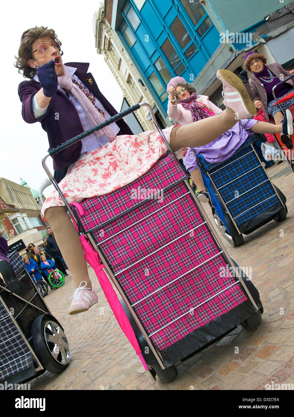 grannies group legs Blackpool, UK. 16th February 2013. Street theatre group Granny Turismo hit  the streets of Blackpool in their suped up shopping trolleys at the start  of the town's annual Showzam festival celebrating circus