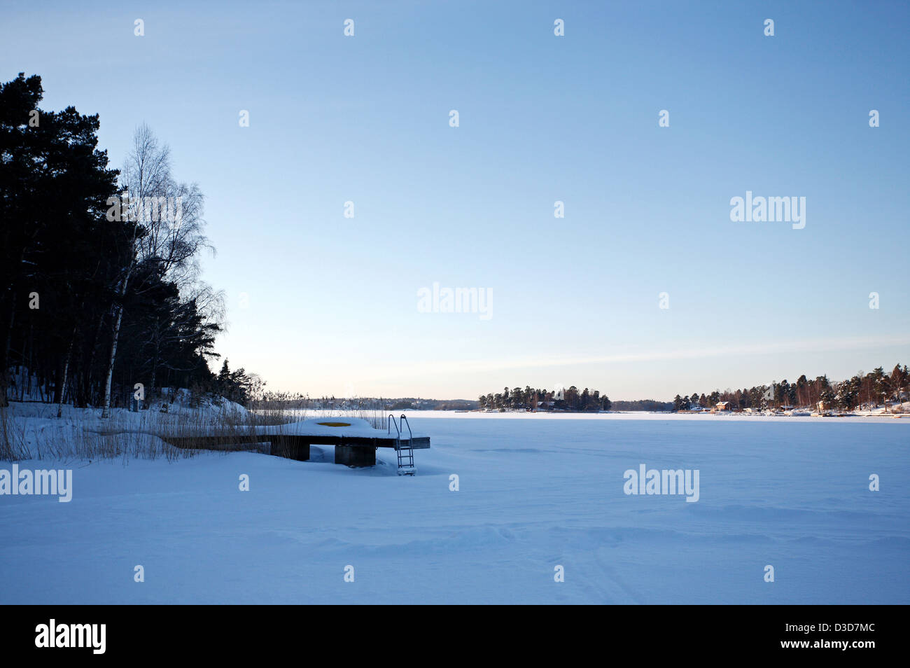 Dill, Sweden, a dock on the shore of a lake near the settlement Trolldalen Stock Photo