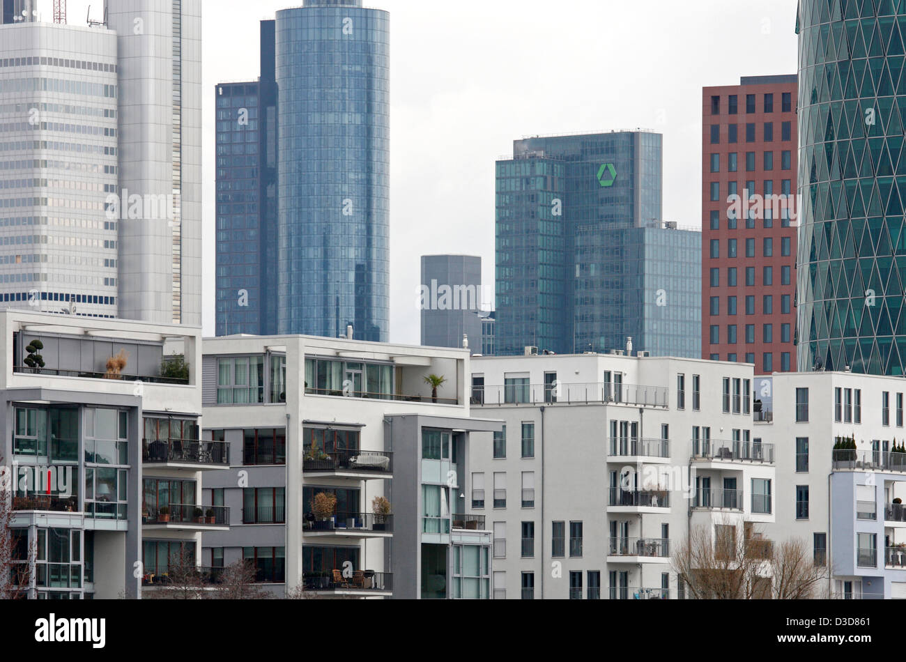 Frankfurt am Main, Germany, Appartmenthaeuser the Western Harbour, behind the towers of the financial district Stock Photo