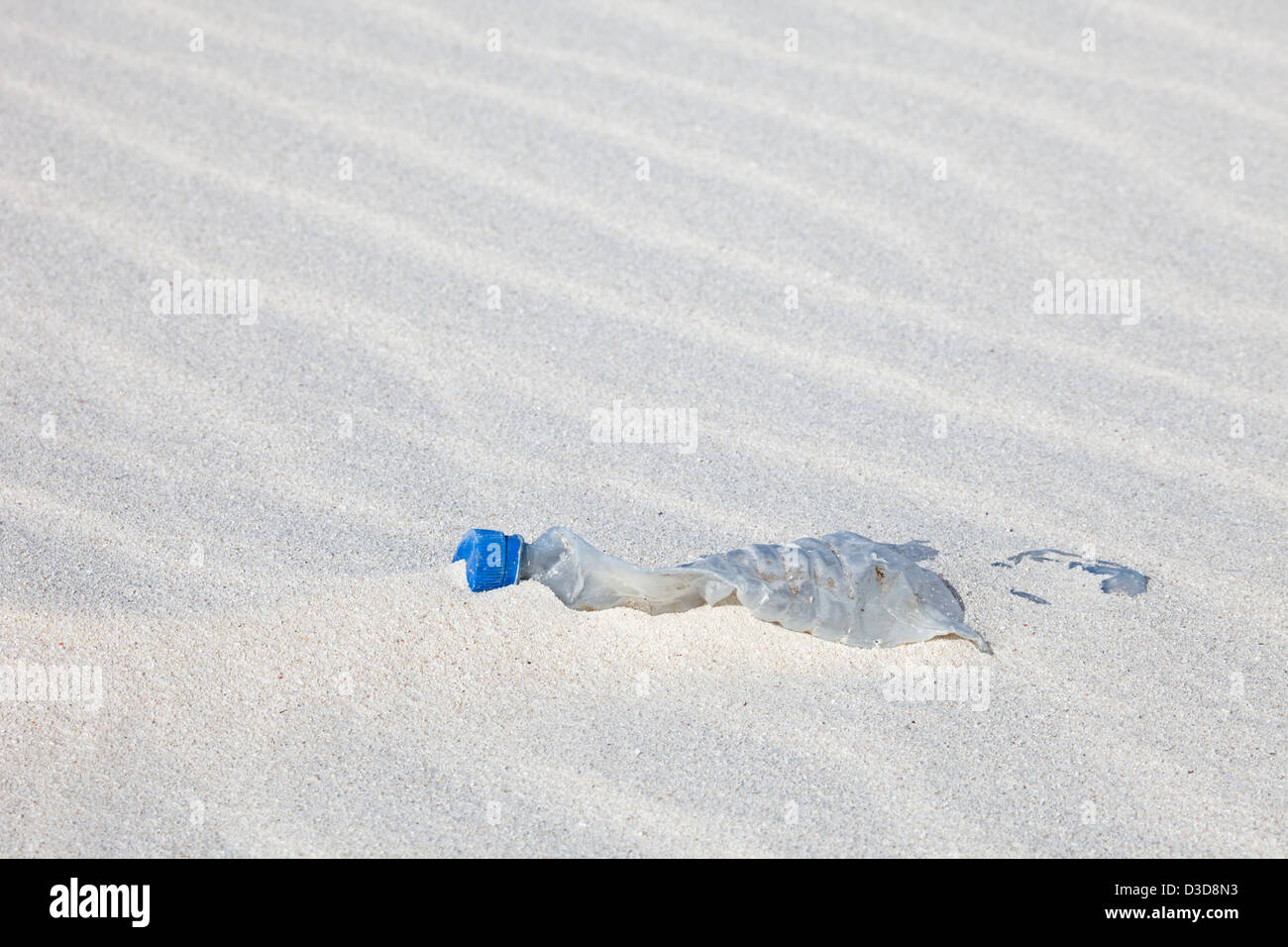 Plastic bottle washed ashore on the beach of a remote island in the North Pacific Ocean Stock Photo