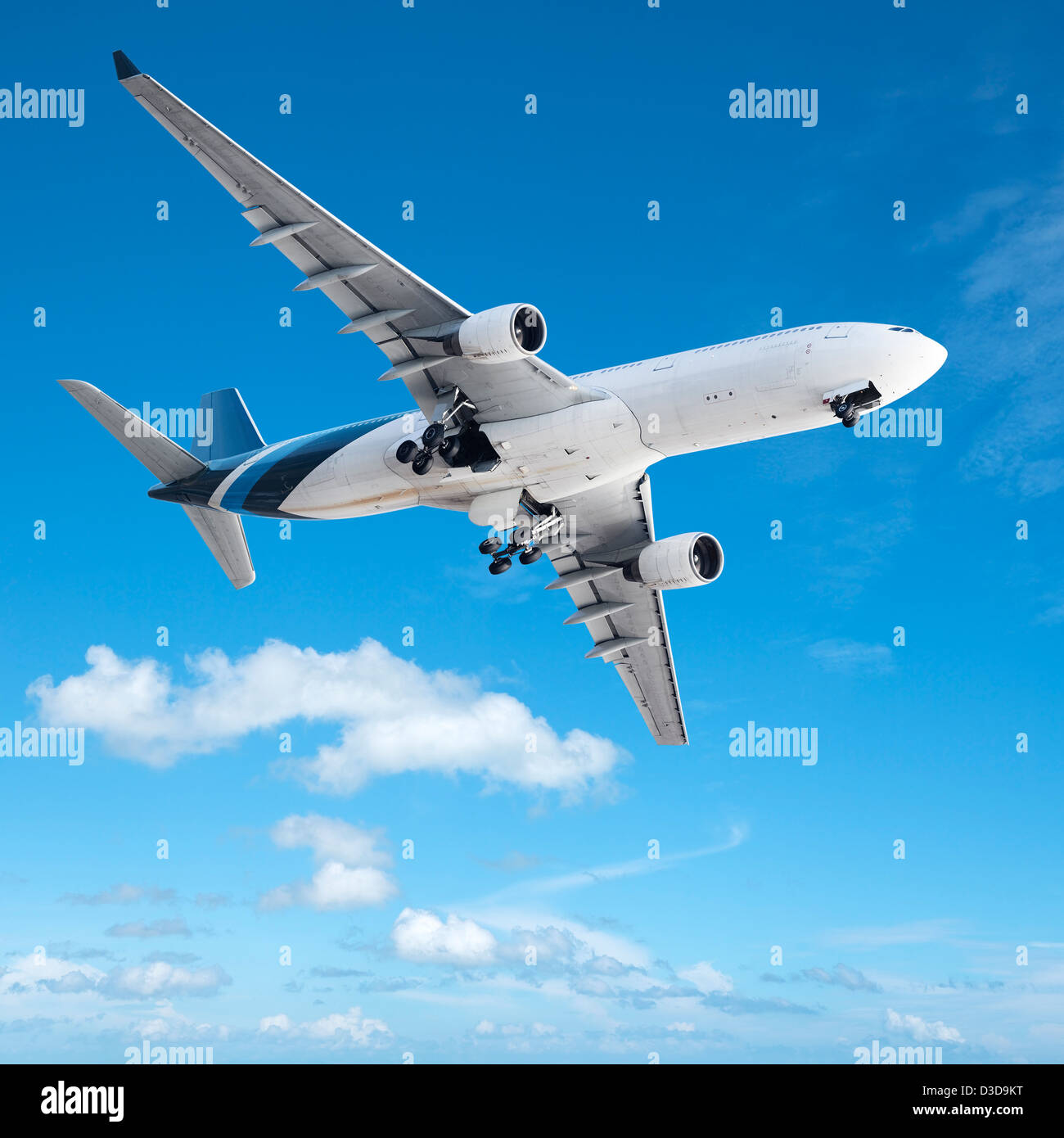 Jet in a clear blue sky. Square composition. Stock Photo