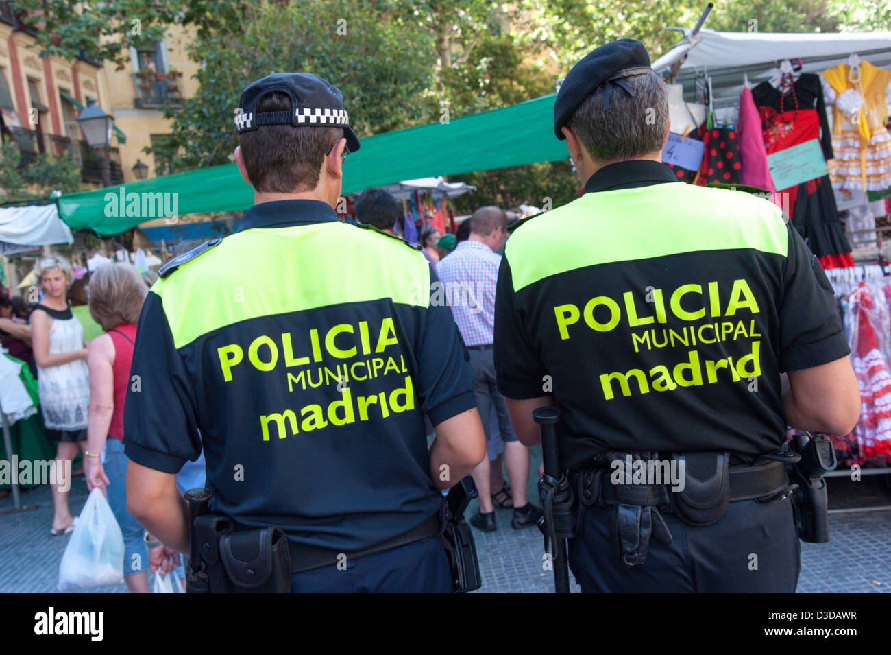 Policia Municipal patrolling the Rastro market, Madrid, Spain Stock Photo