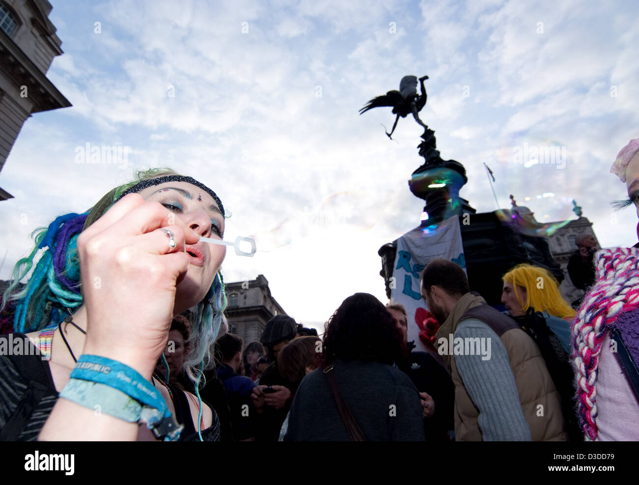 Pretty Bubbles in the air, A Bubble Blowing during the 10th anniversary of Reclaim Love Celebrations, Piccadilly circus London Stock Photo