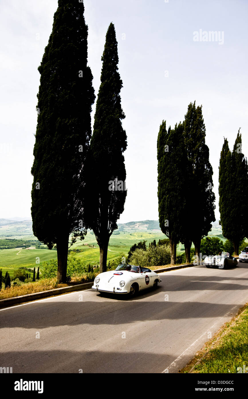 Vintage cars on country road, Mille Miglia race, Italy, Stock Photo