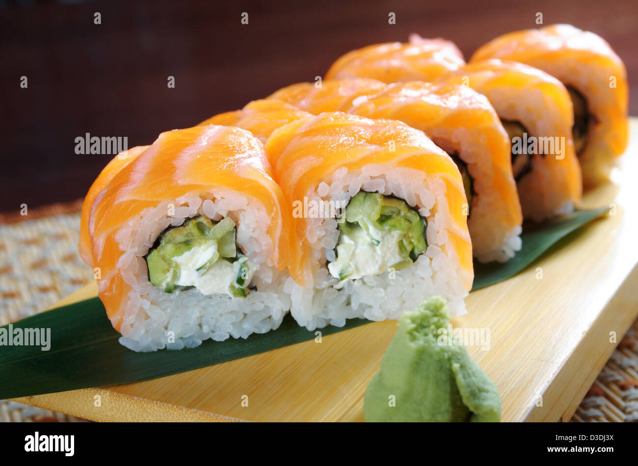 Uramaki. Philadelphia classic. Salmon, Philadelphia cheese, cucumber, avocado, tobiko. Japanese sushi Stock Photo