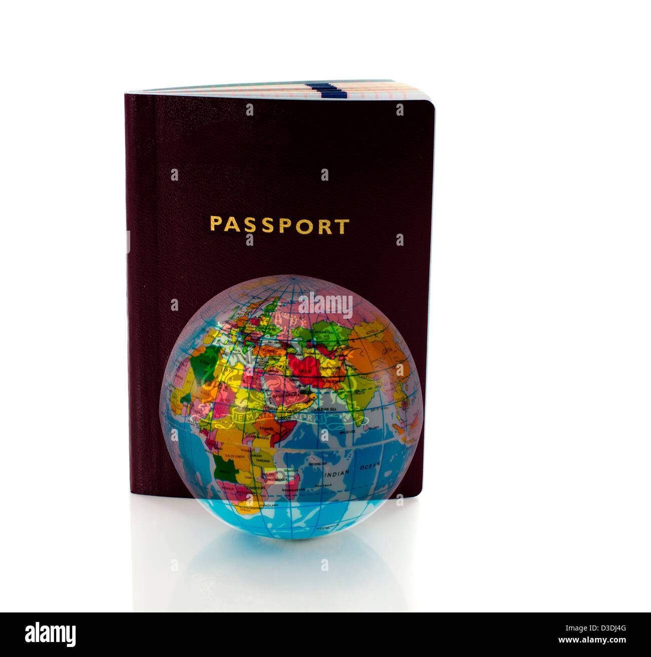 passport to travel around the world with world globe on foreground Stock Photo