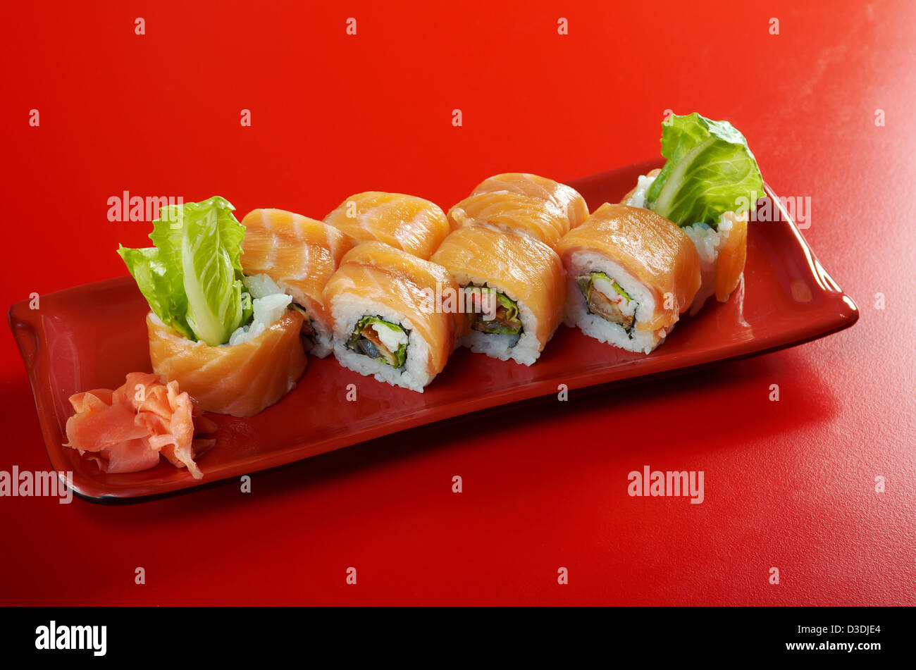 Uramaki. Philadelphia classic. Salmon, Philadelphia cheese, cucumber, avocado, tobiko. Japanese sushi Stock Photo