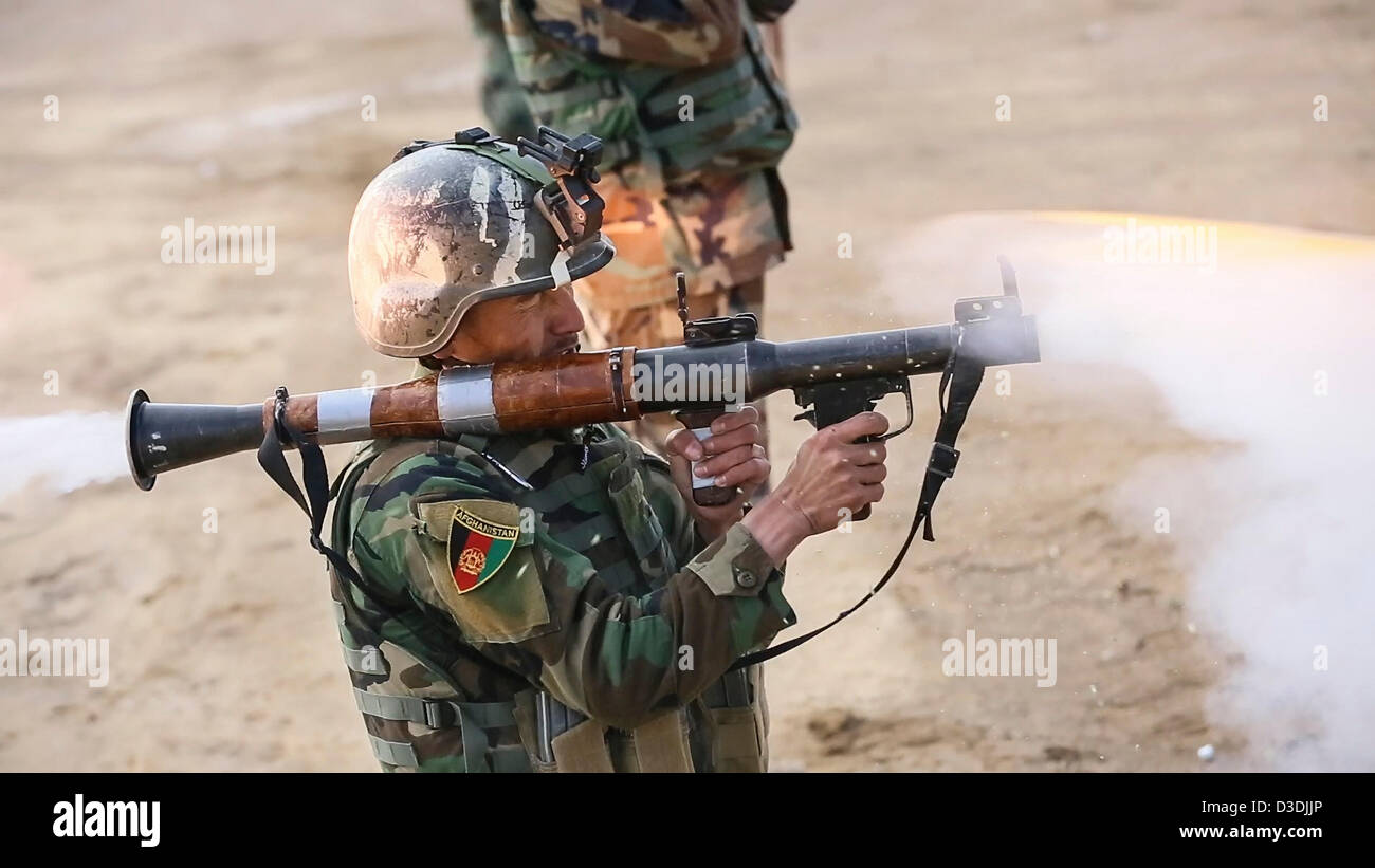 An Afghan commando practices firing a rocket propelled grenade during