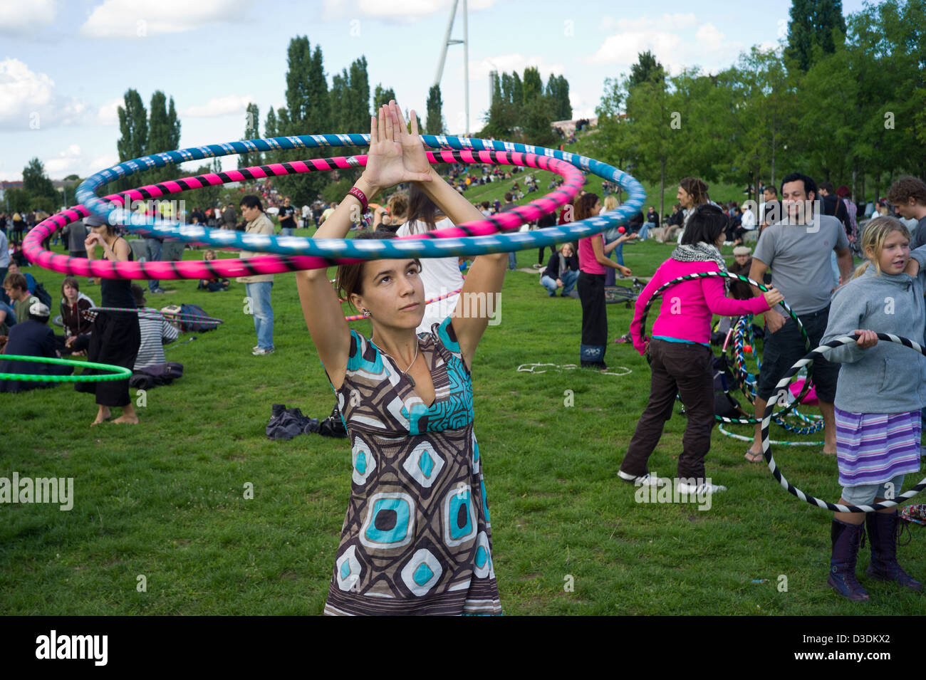 Berlin, Germany, people with hula-hoops in the Wall Park Stock Photo