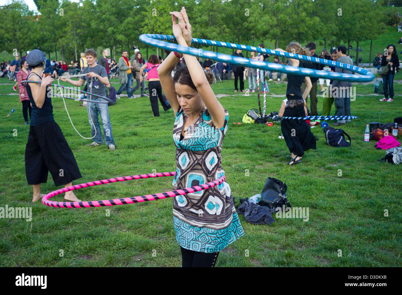 Berlin, Germany, people with hula-hoops in the Wall Park Stock Photo