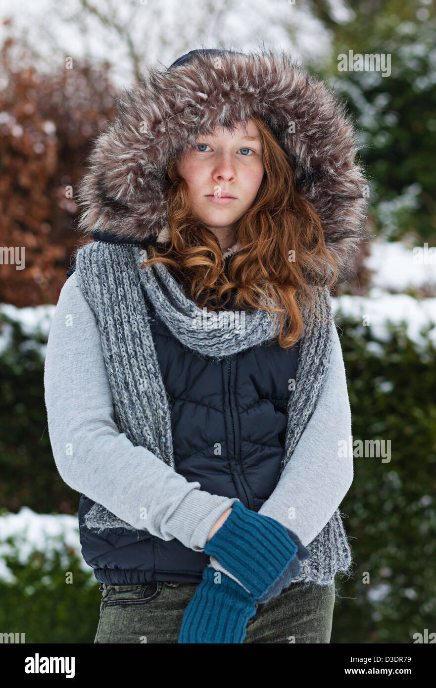 Outdoor portrait of a teenager girl in winter cloths Stock Photo