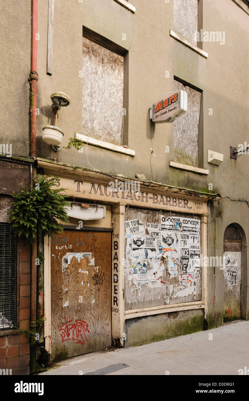 Old derelict barbers shop Stock Photo