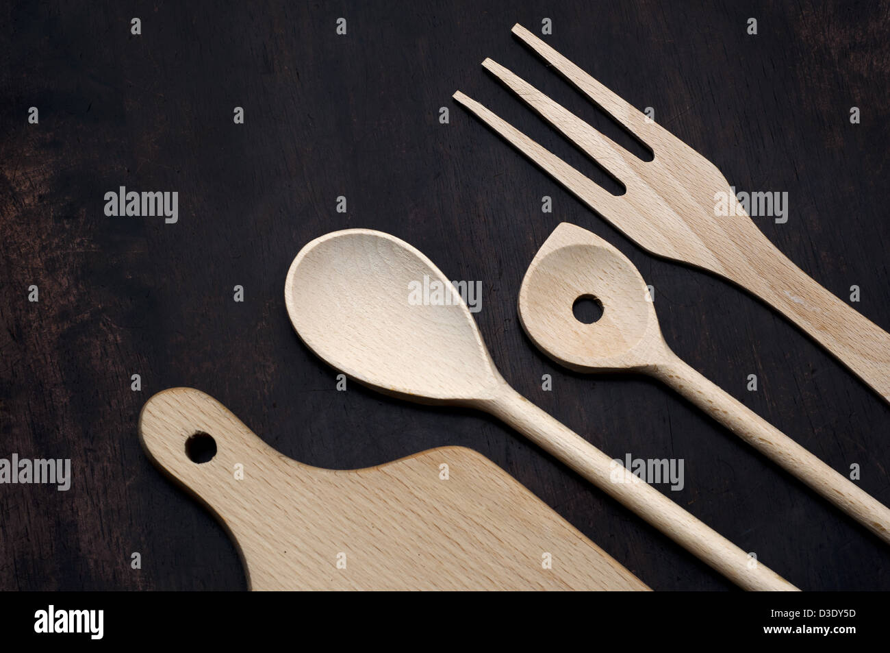 Wooden kitchen spoon on desk Stock Photo - Alamy