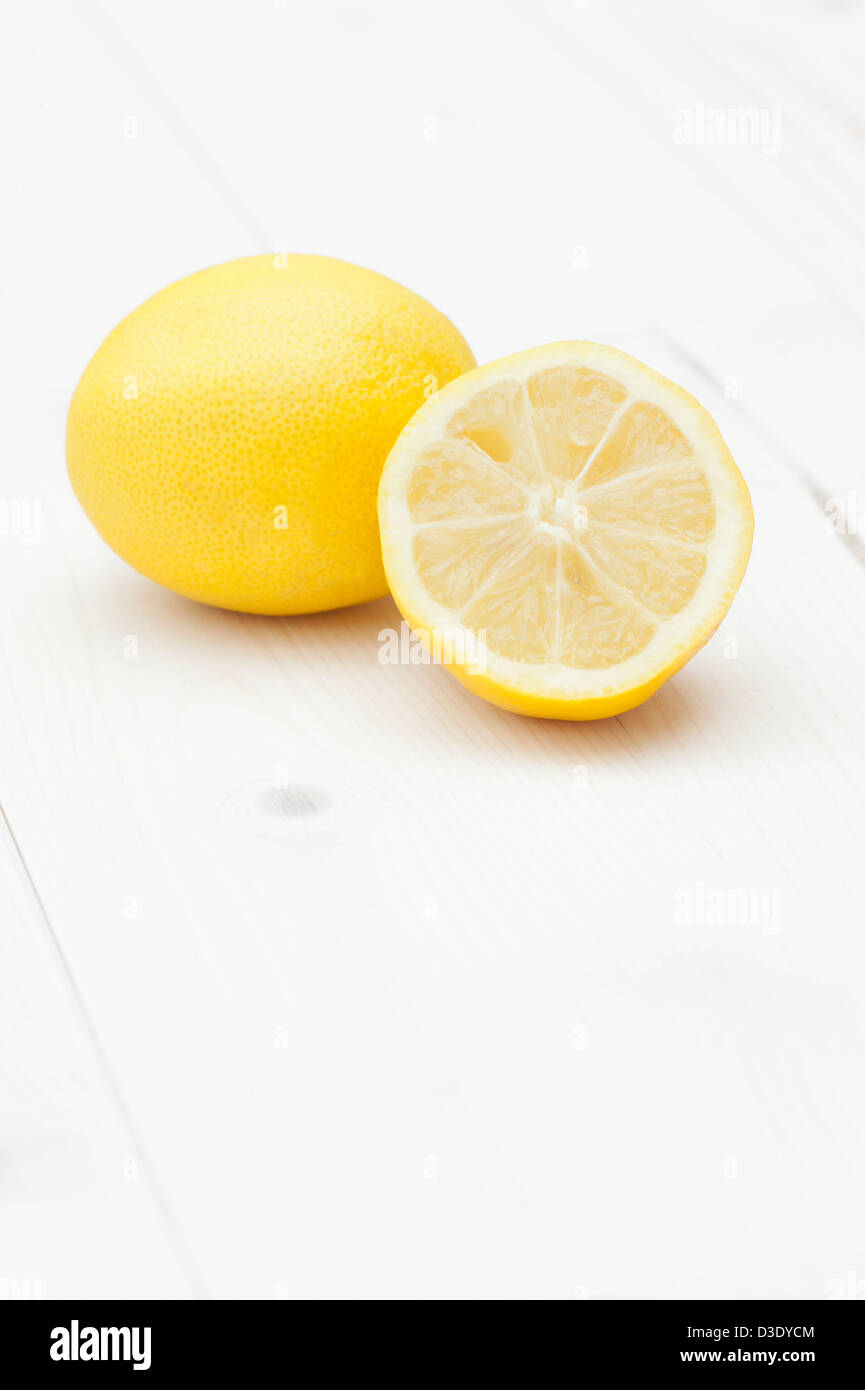 Whole lemon and a half lemon Stock Photo