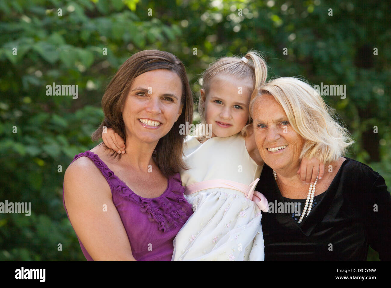 Portrait of a girl with her mother and grandmother Stock Photo - Alamy