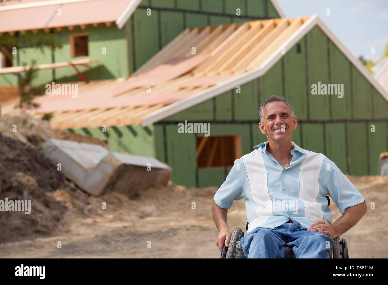 Man with spinal cord injury in a wheelchair at his new accessible home ...