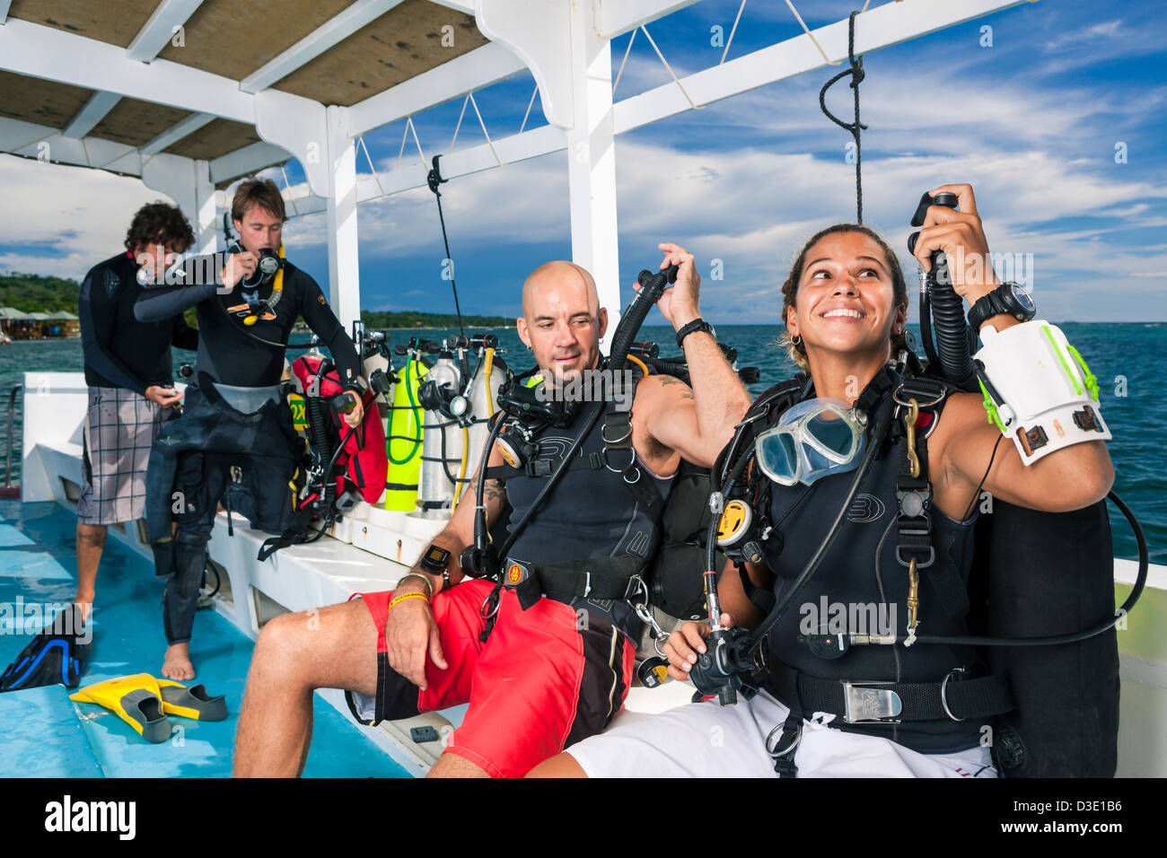 SCUBA divers check dive equipment before diving Stock Photo