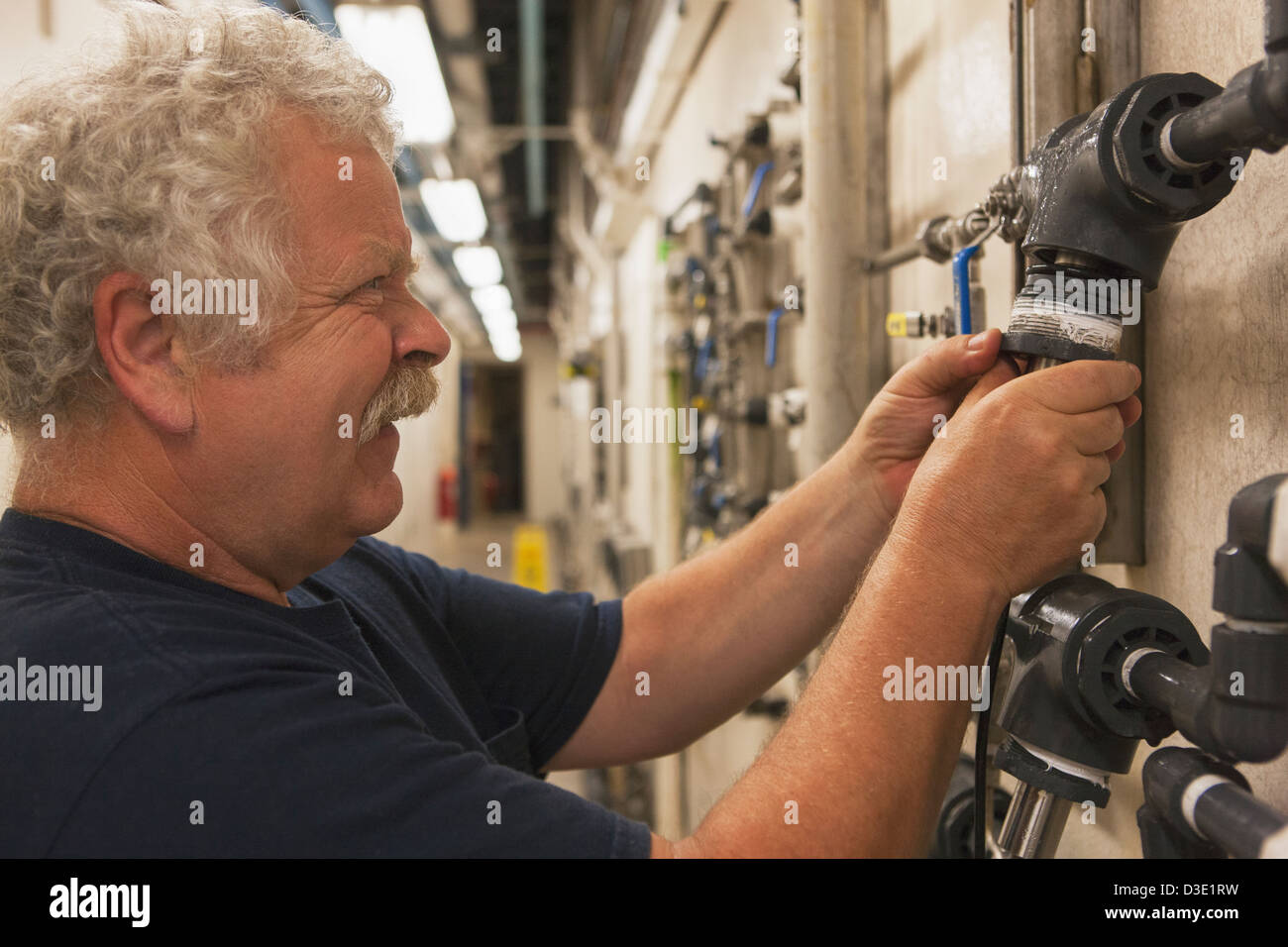 Engineer putting a rebuilt O2 electrochemical sensor probe into service