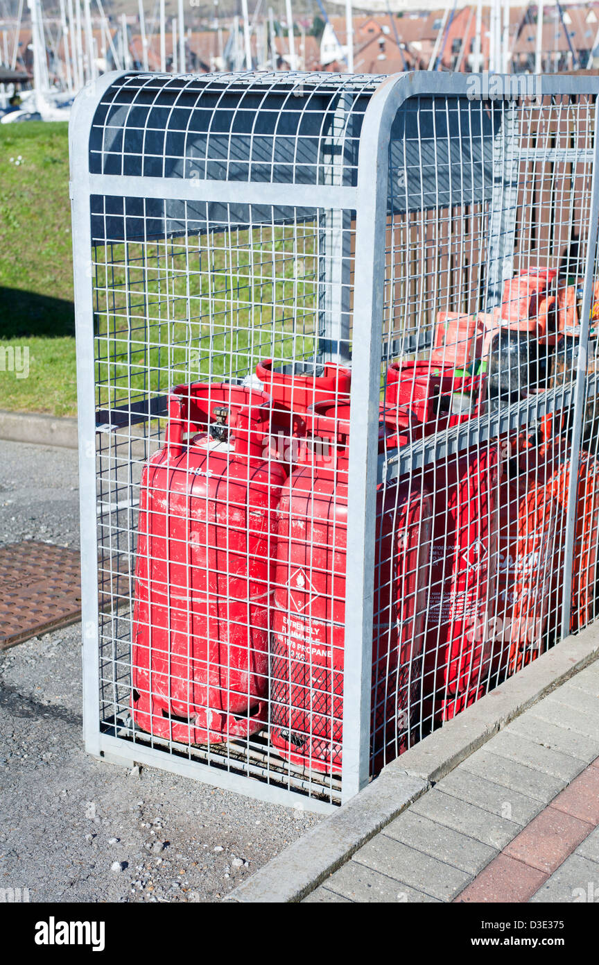 propane gas cylinders being stored in a steel cage for safety Stock Photo -  Alamy