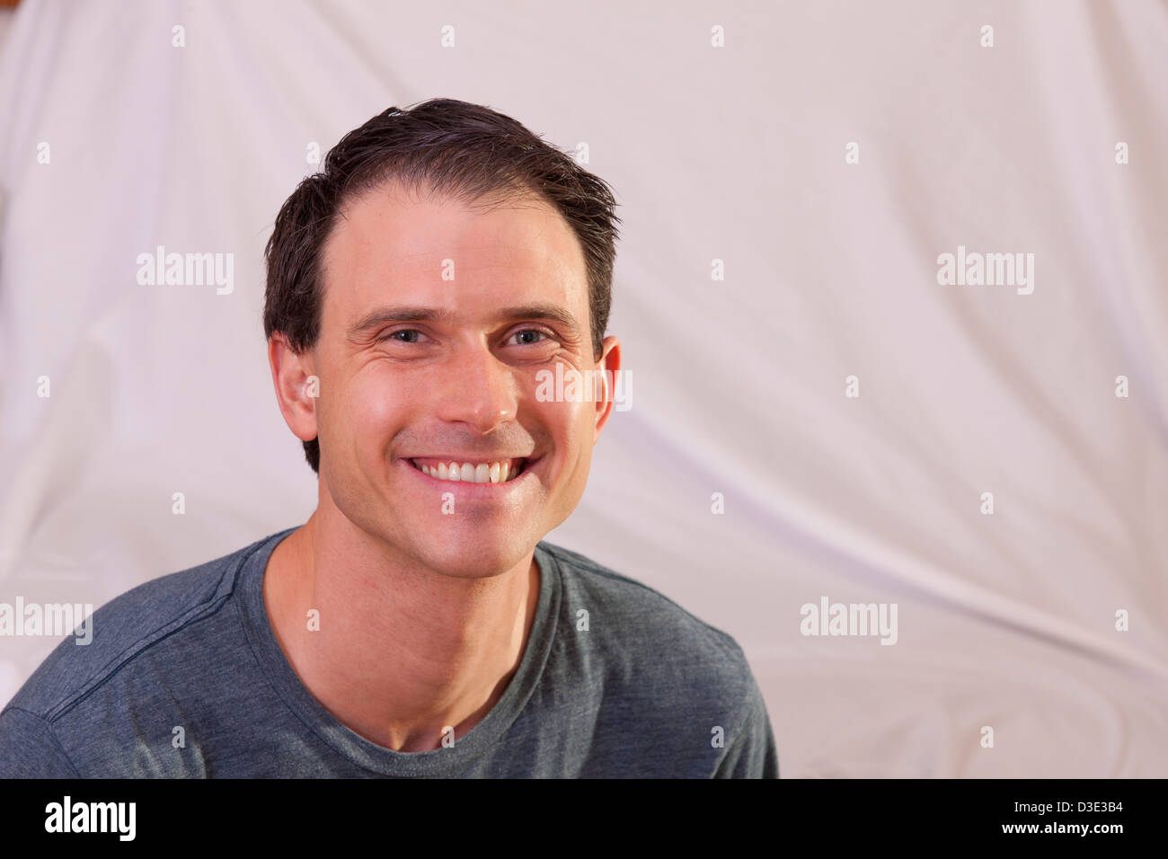 Portrait of a man smiling Stock Photo - Alamy
