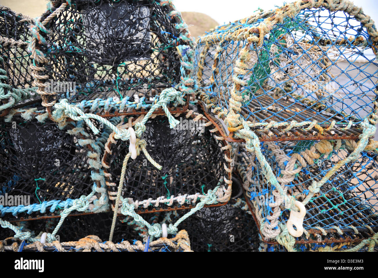 Stacked lobster pots at St Andrews harbour. Stock Photo