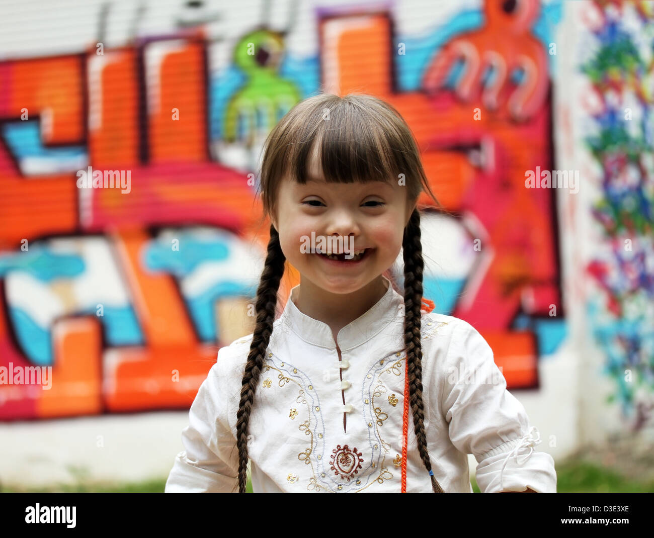 Portrait of beautiful young girl on the playground Stock Photo - Alamy