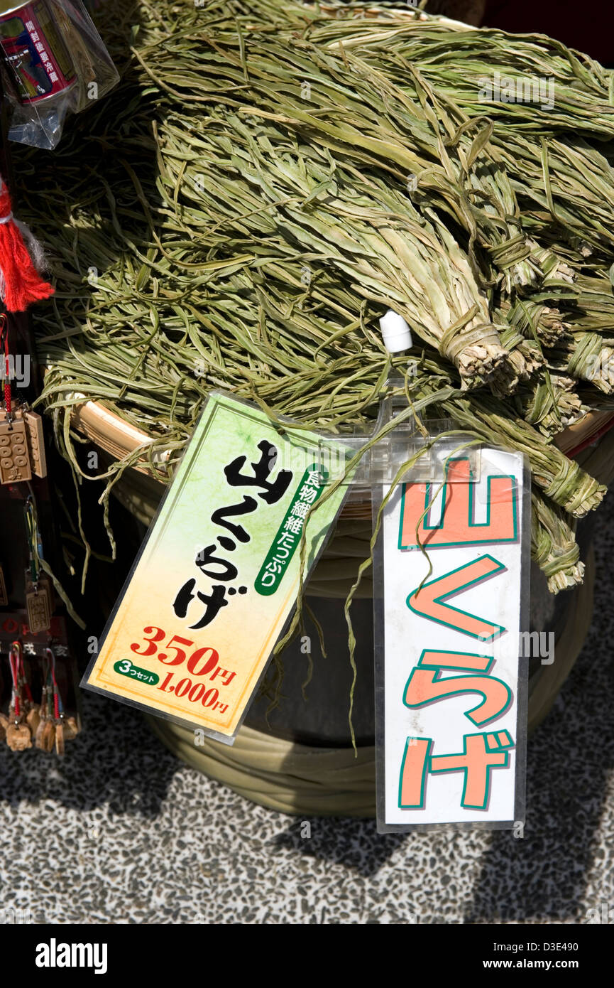 Healthy yamakurage, or sansai natural organic mountain vegetables, for sale in an outdoor market in Nagano City. Stock Photo