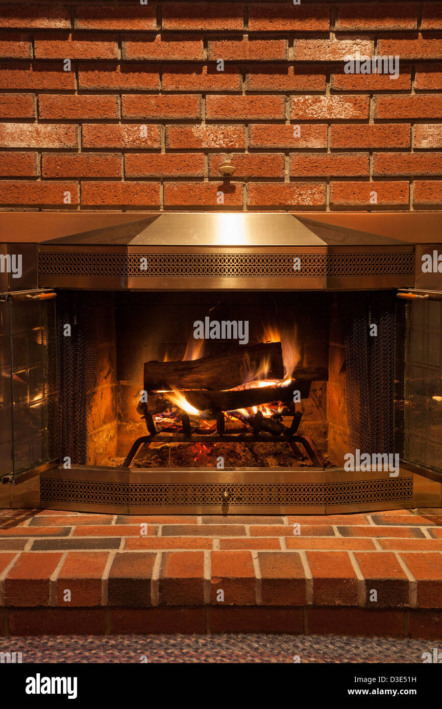Fire in Fireplace, Residential Home, USA Stock Photo