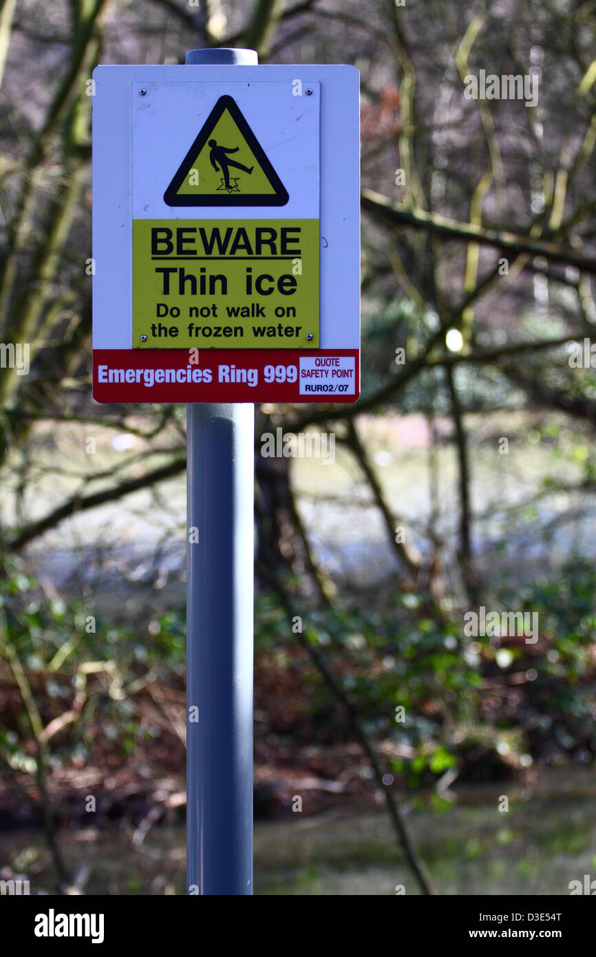 Beware thin ice sign Stock Photo