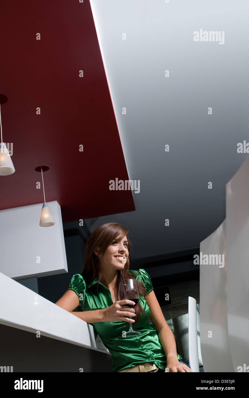 Woman holding glass of wine hi-res stock photography and images - Alamy