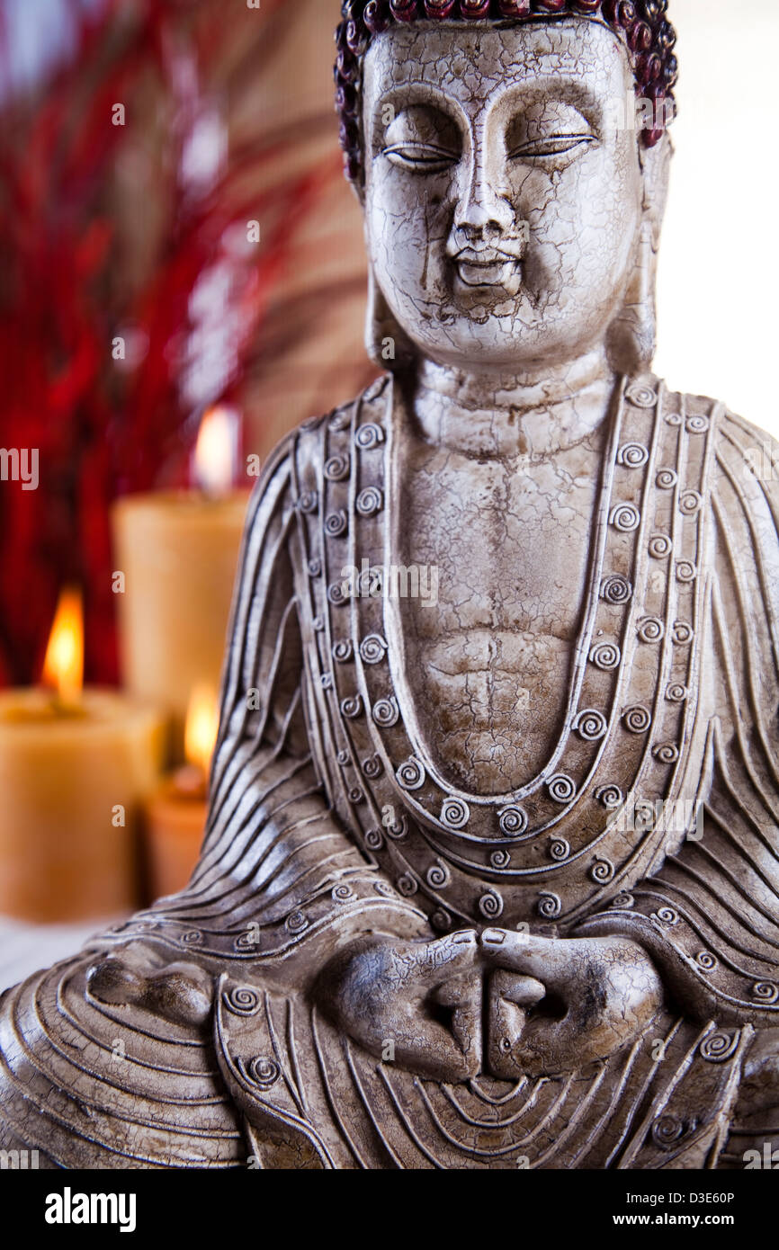 Buddha statue in a meditation and candles Stock Photo Alamy