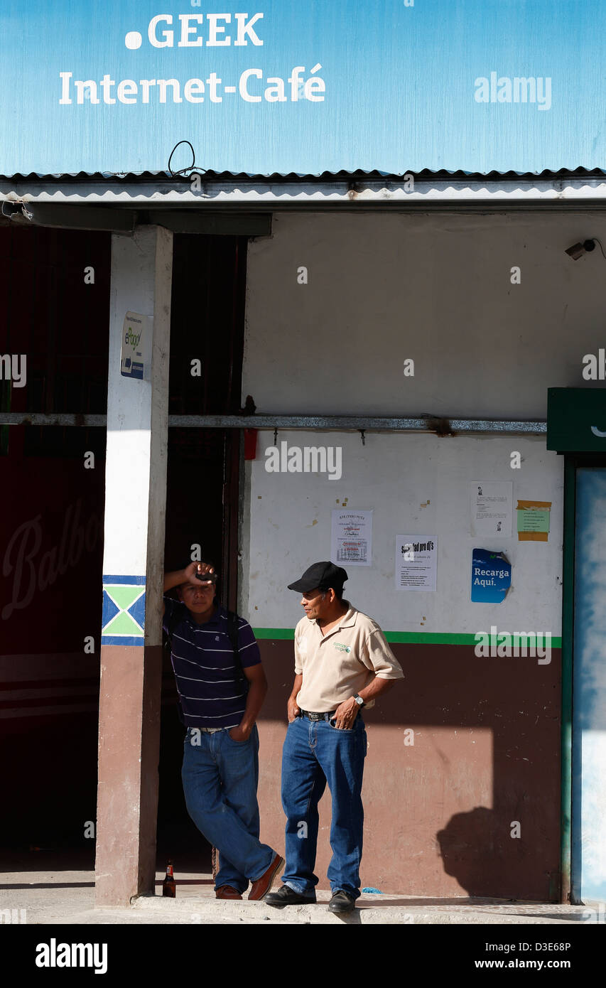 Men in front of Internet cafe, El Valle, Panama Stock Photo