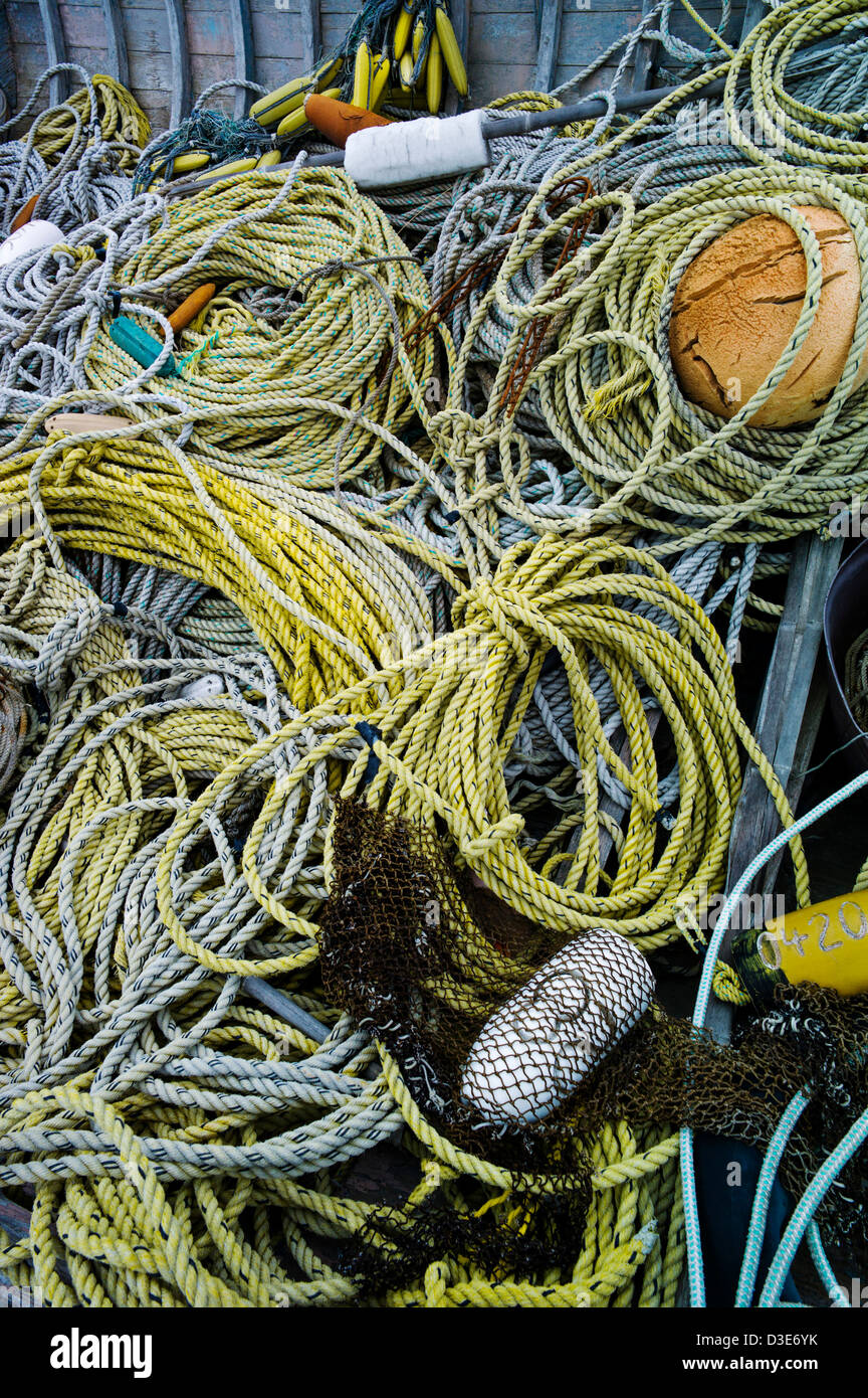 A virtual outdoor museum of fishing and boating gear adorn a property on the Homer Spit, Homer, Alaska, USA Stock Photo