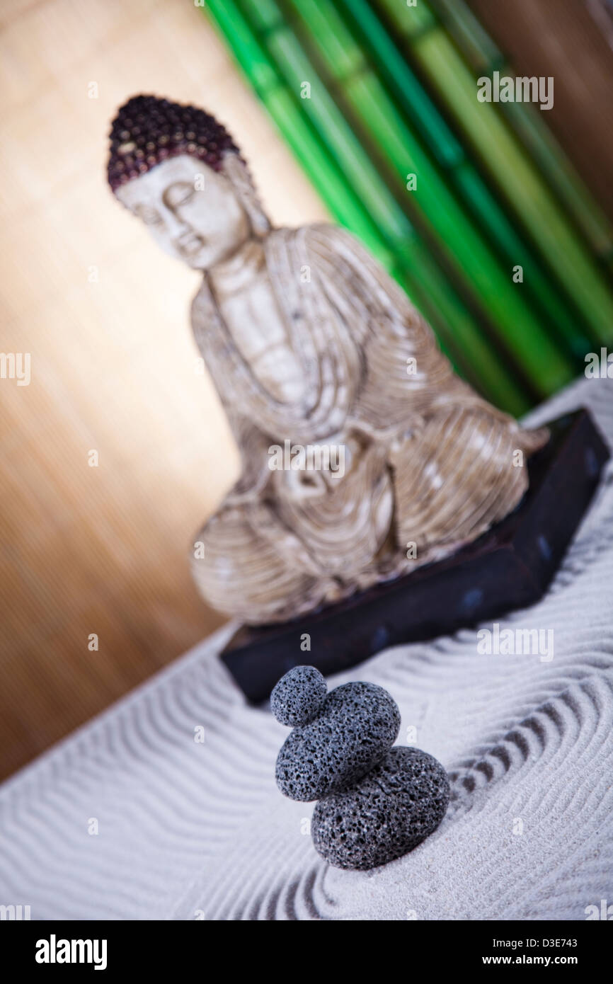 Buddha statue and bamboo Stock Photo - Alamy