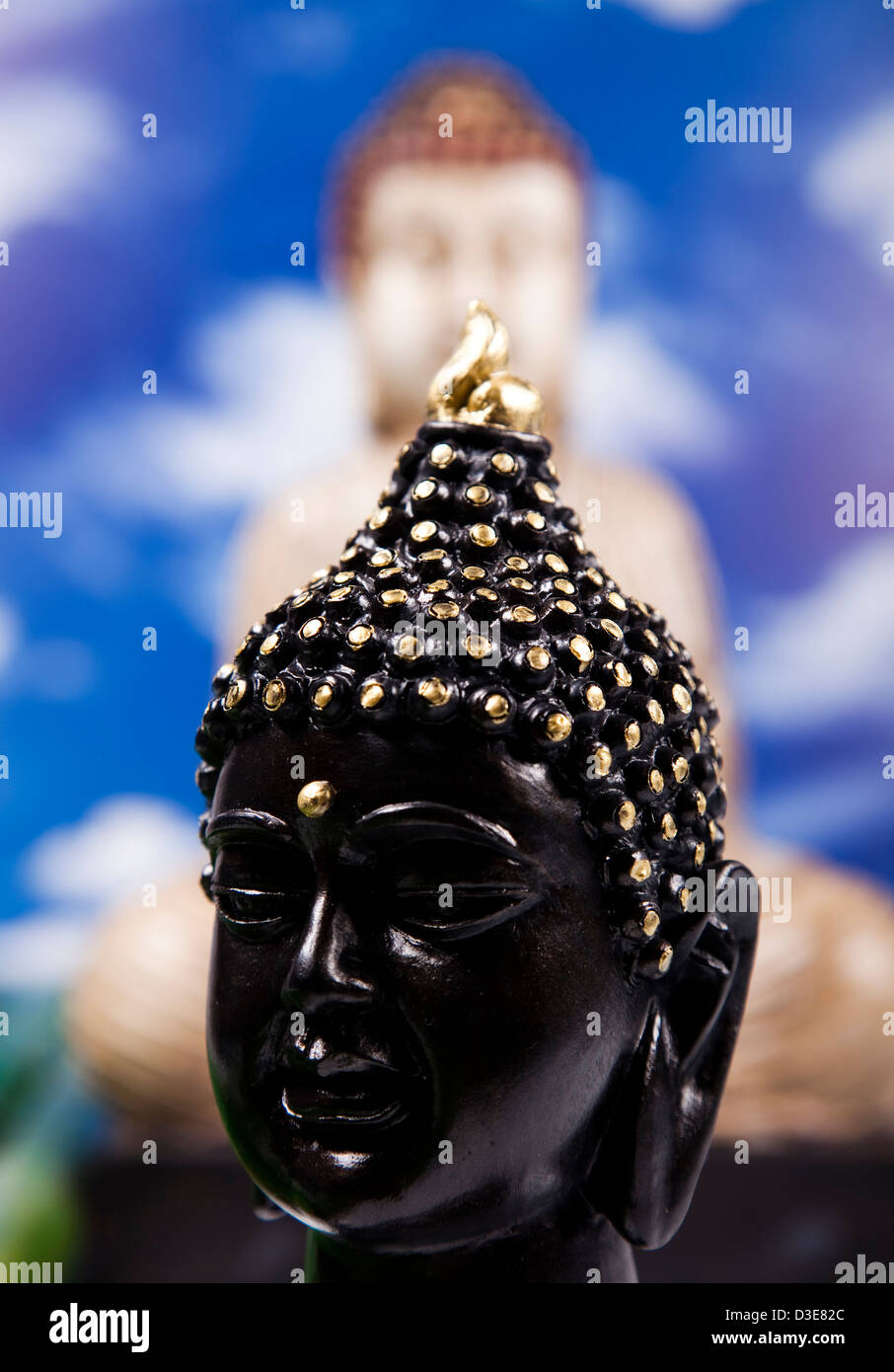 Buddha and blue sky background Stock Photo - Alamy