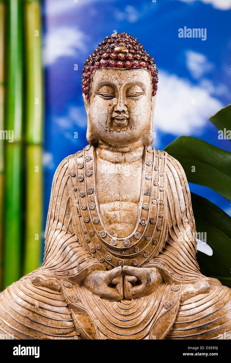 Buddha and blue sky background Stock Photo Alamy