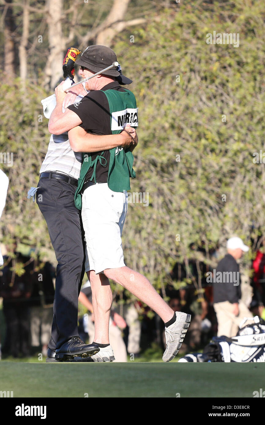 Feb. 17, 2013 - Pacific Palisades, California, U.S. - 02/17/13 Pacific Palisades, CA: John Merrick and caddie Ryan Goble celebrate after winning the Northern Trust open on the second playoff hole.  t (Credit Image: © Michael Zito/Eclipse/ZUMAPRESS.com) Stock Photo