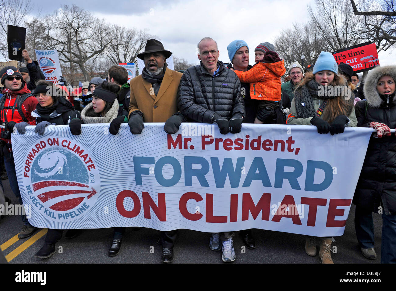 Feb. 17, 2013 - Washington, DC, U.S. - Climate activist Bill McKibben, Sierra Club Executive Director Michael Brune (with daughter) and others lead tens of thousands in a march on the National Mall and past the White House to urge President Obama to reject the Keystone XL pipeline and to show leadership on other climate change issues. (Credit Image: © Jay Mallin/ZUMAPRESS.com) Stock Photo