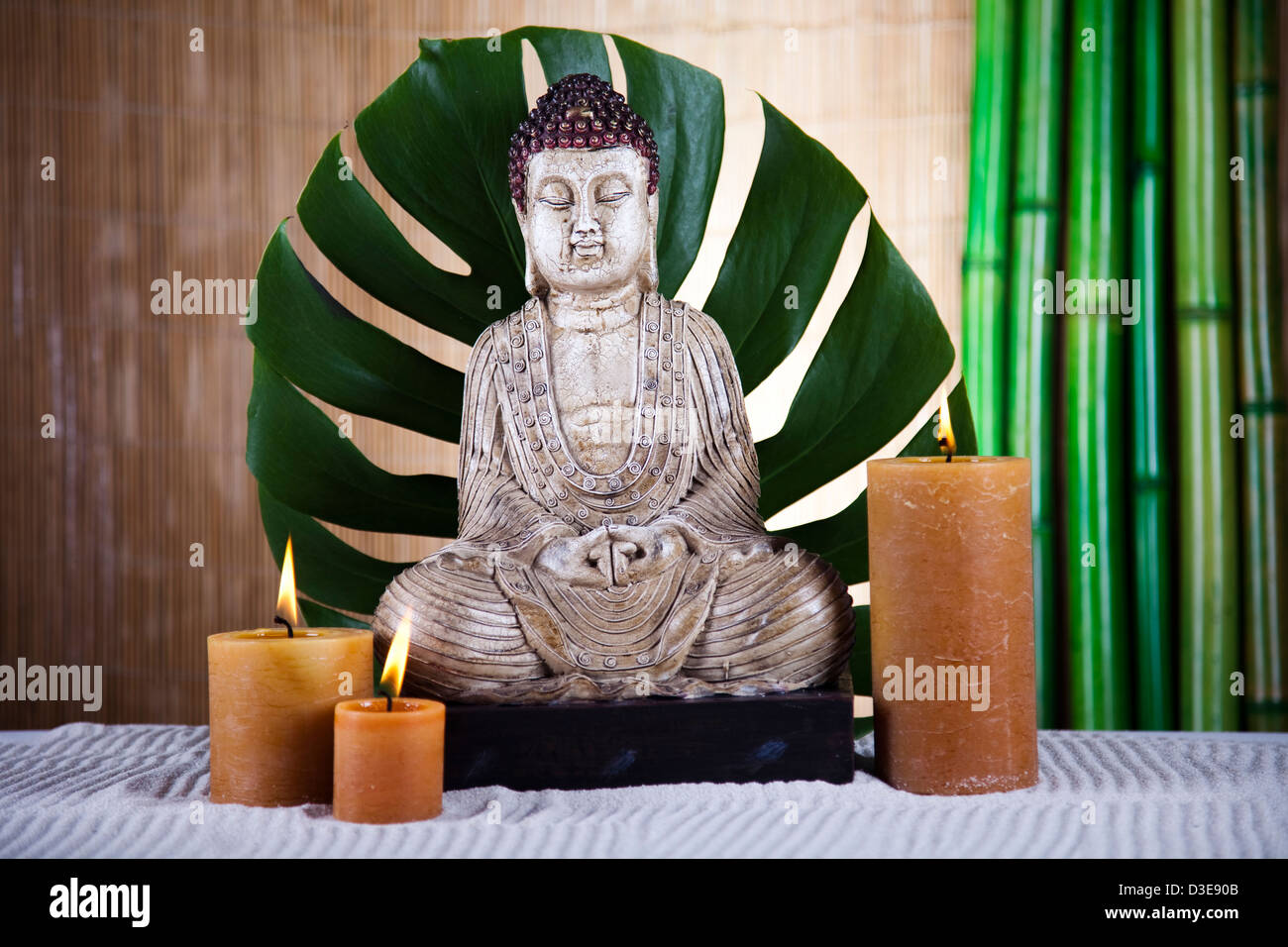 Buddha statue and bamboo Stock Photo - Alamy