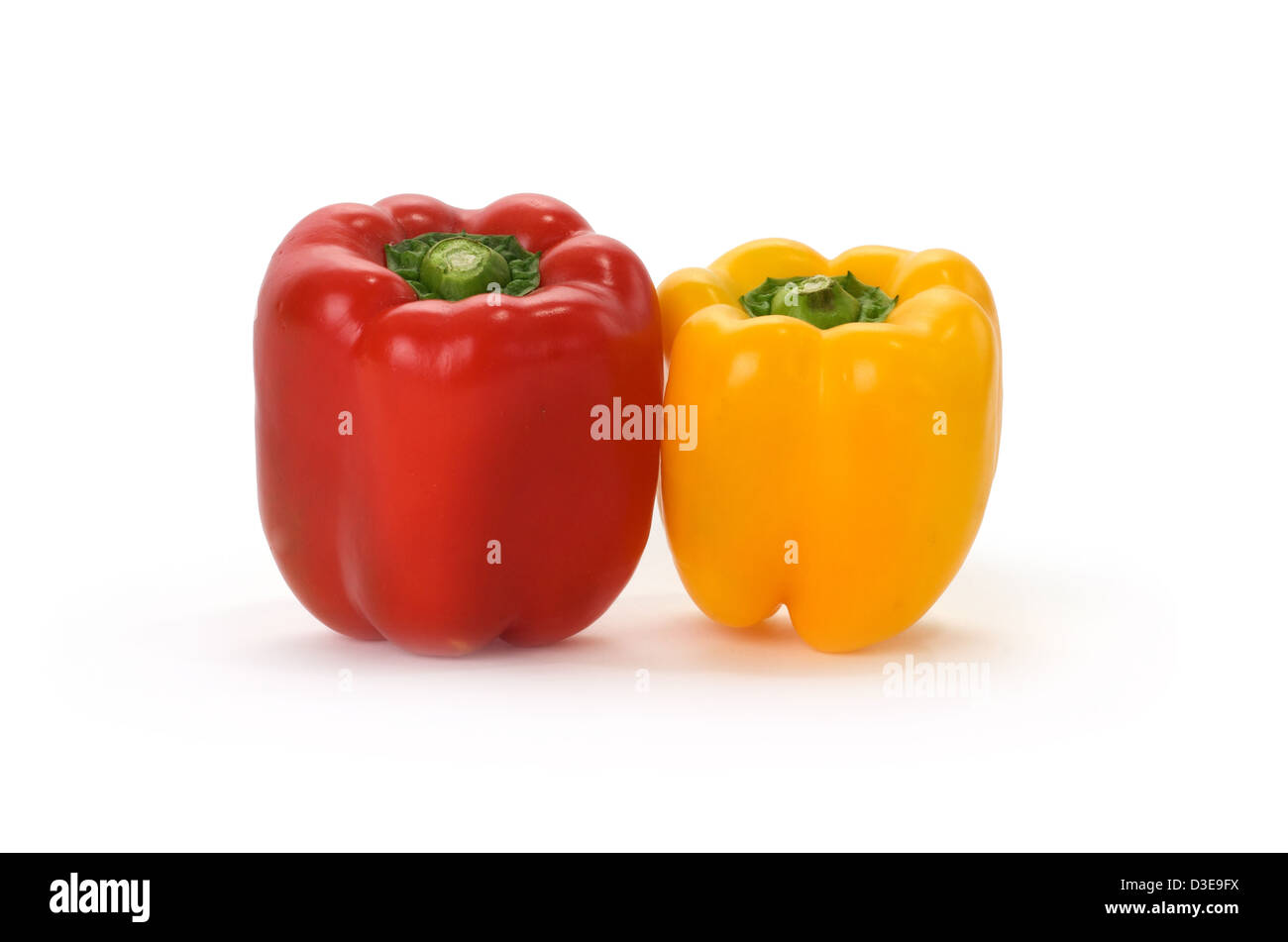 Isolated Red and yellow bell pepper in white background Stock Photo - Alamy