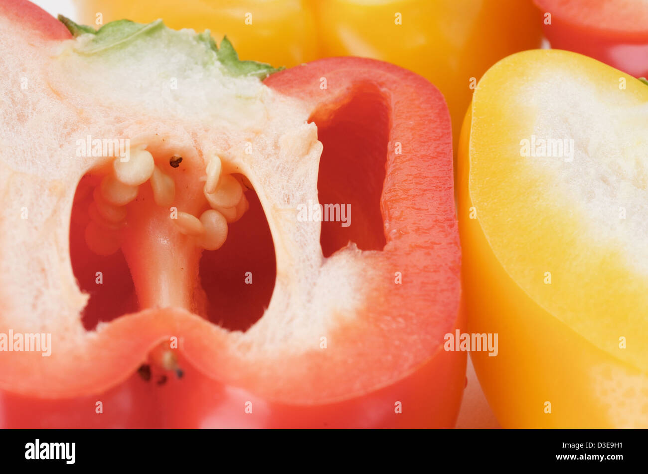 cut yellow and Red bell pepper in white background Stock Photo - Alamy