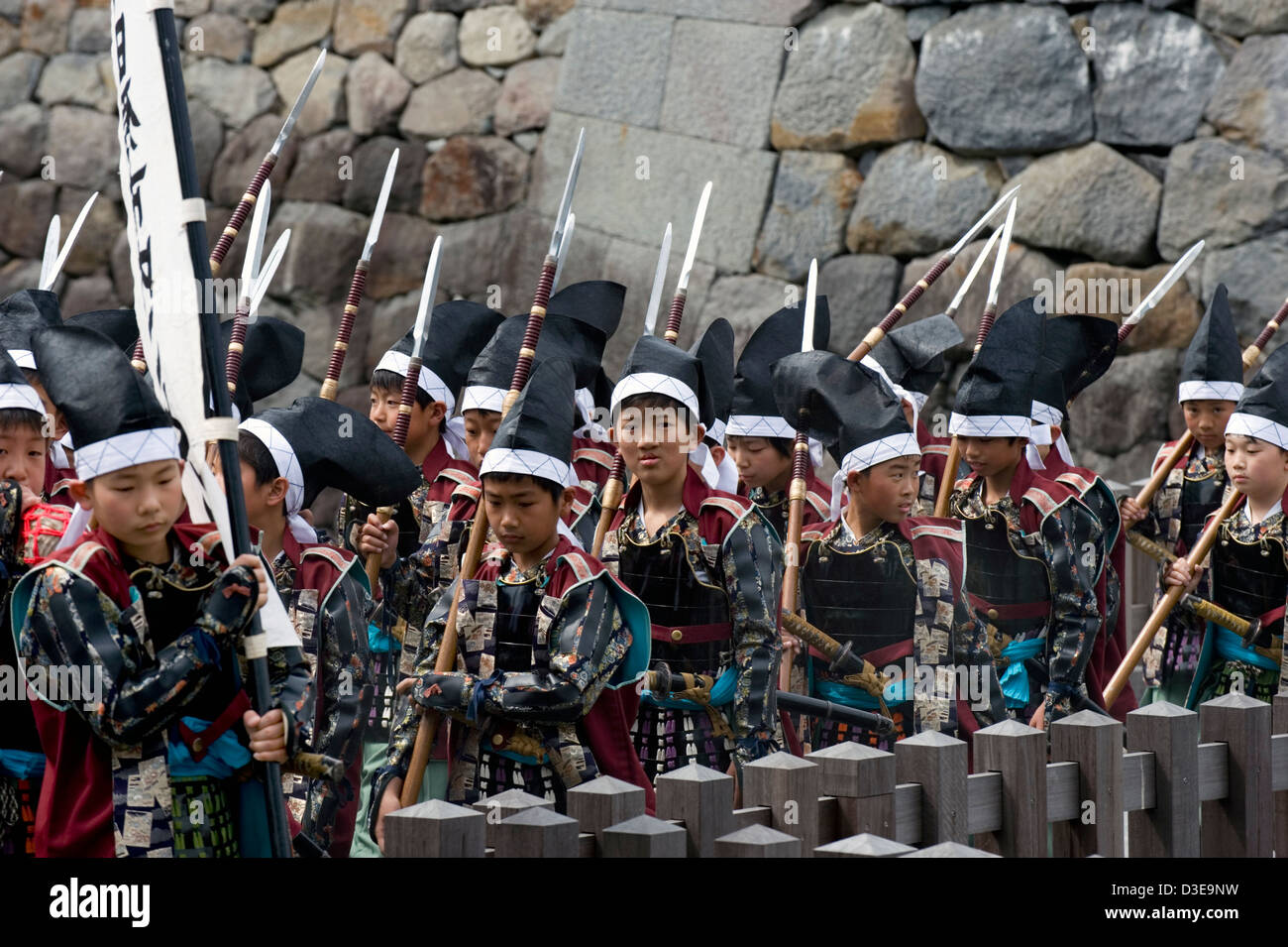 Young boy samurai warriors wearing traditional costumes partake in Odawara Hojo Godai Matsuri festival at Odawara Castle, Japan. Stock Photo