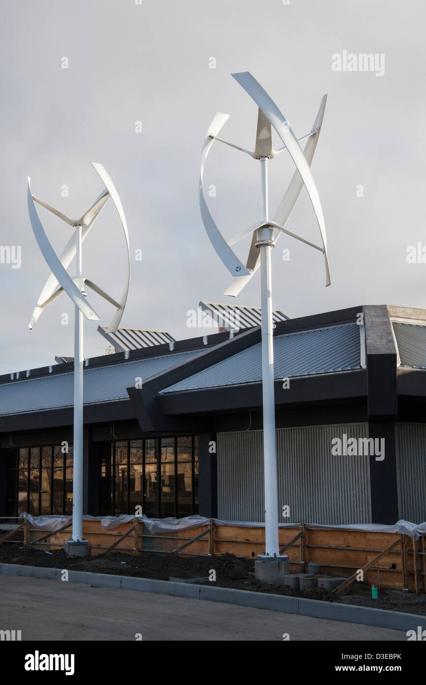 Two vertical axis wind turbines at the Zero Net Energy Center under construction in San Leandro, California. Stock Photo