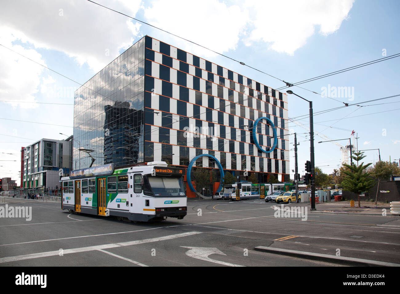 Melbourne city tram passing in front of the striking visual facade of the 1010 LaTrobe Street Melbourne city tram passing in front of the striking visual facade of the 1010 LaTrobe Street