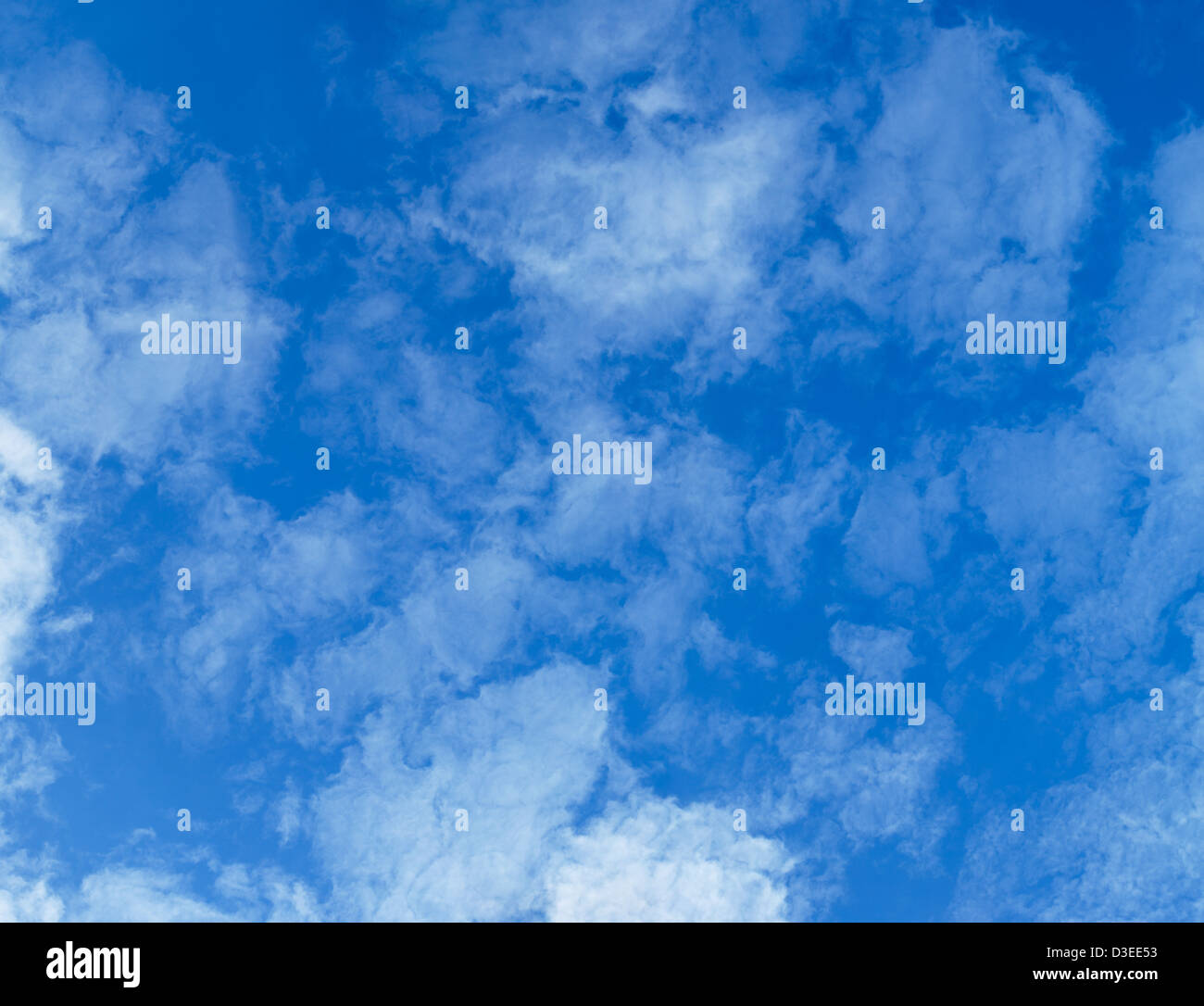 Light, transparent cumulus clouds in the sky - the zenith Stock Photo