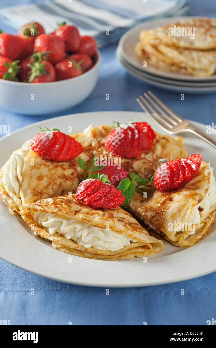 Crepes strawberries pancakes dessert hi-res stock photography and